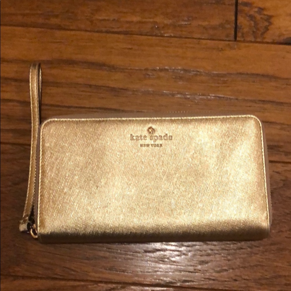 Kate Spade zip wallet with wristlet strap gold
